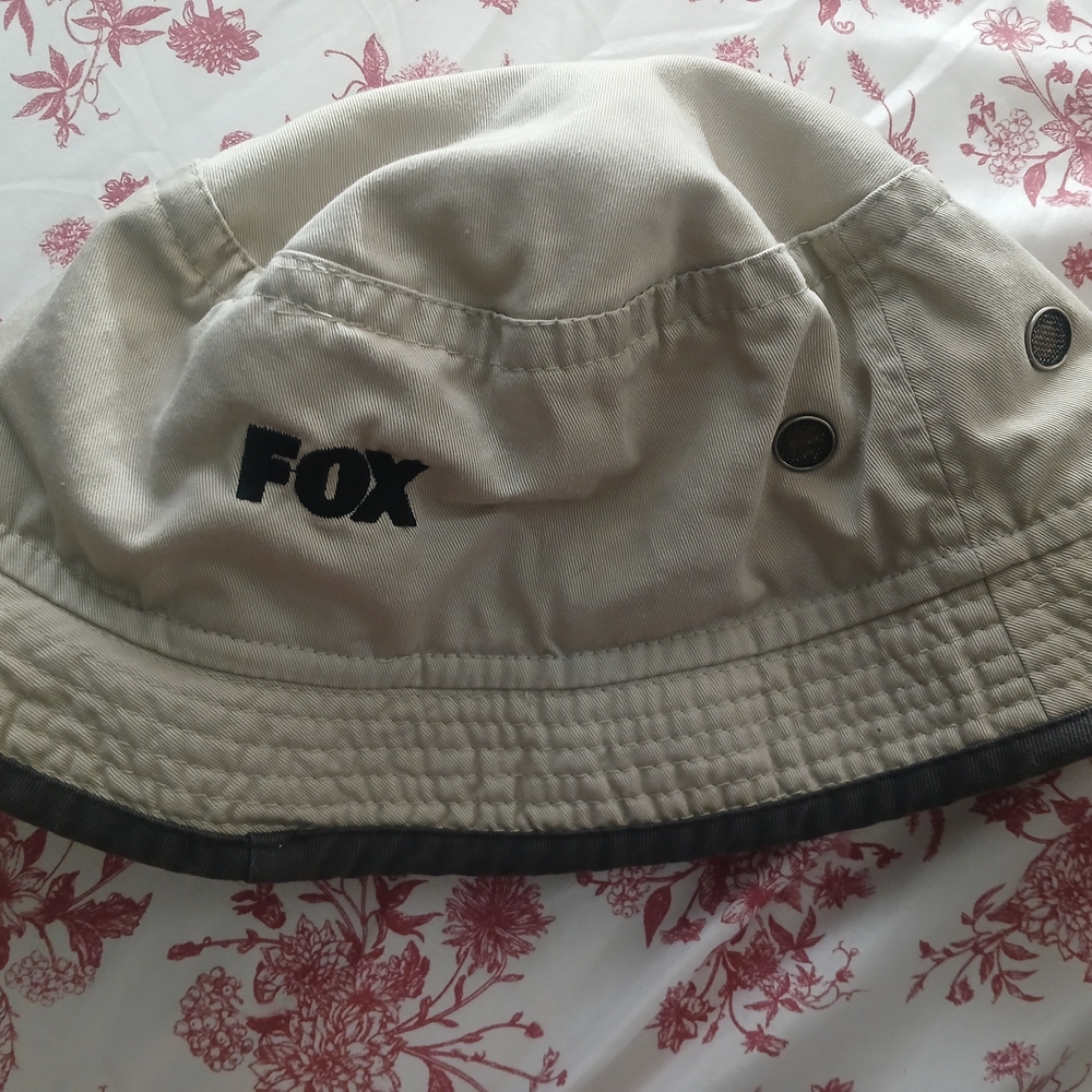 Cream and Black Bucket Hat for Outdoor Adventures